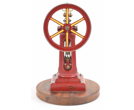 Tubal Cain Williamson single inverted cylinder live steam column engine, with dummy governor driving a spoked flywheel, on wo