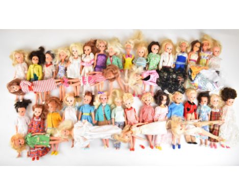 Thirty six mostly vintage Sindy fashion dolls by Pedigree and Hasbro, all in original outfits.