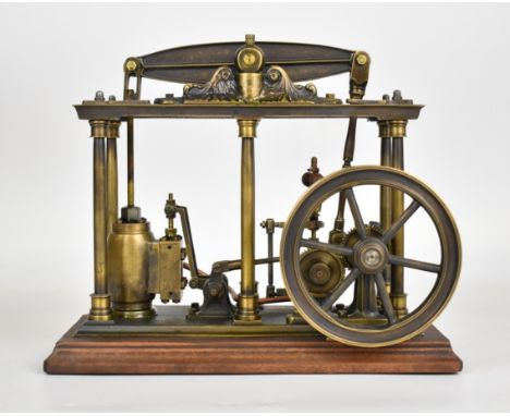 Likely Polish built live steam beam engine with spoked flywheel and gear driven working governor, on wooden base, overall len