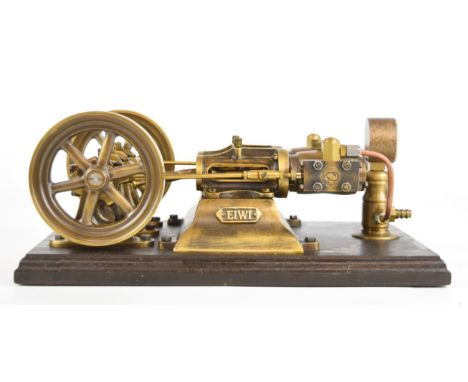 Polish made Eiwi twin cylinder live steam engine with twin spoked flywheels, on wooden base with pressure gauge, overall leng