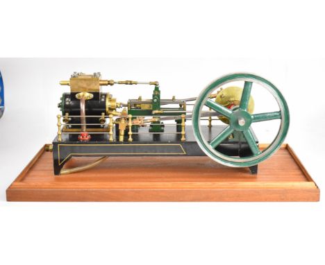 Single cylinder live steam engine modelled on an 1890's mill engine with spoked flywheel, disc crank and eccentric driven fee