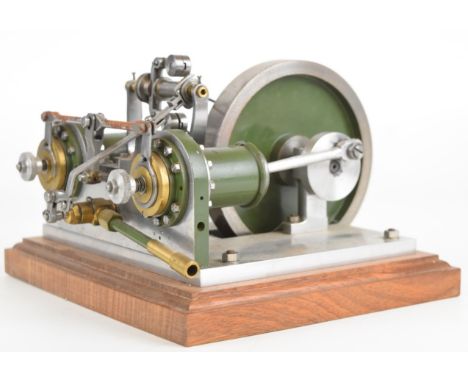 Unusual rotary valve live steam twin cylinder engine with eccentric driven rotary or disc valves, with working governor, on w