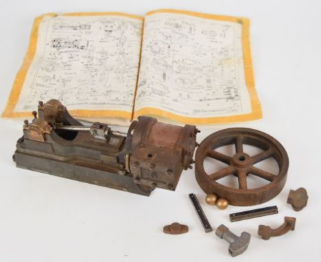 Part built Stuart No 9 live steam single cylinder engine, with spoked flywheel and parts for a governor, overall length 30cm