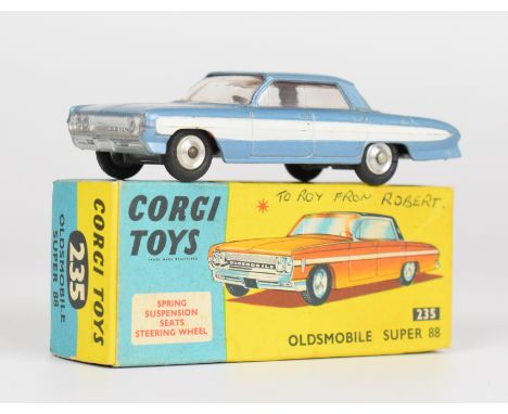 Corgi Toys diecast model Oldsmobile Super 88 with pale blue body, white racing stripe and red interior, 235, in original box.