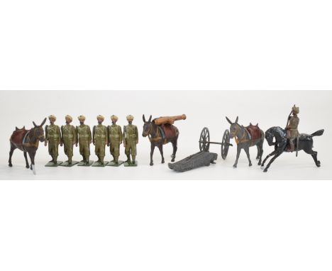 Britains Indian Army Mounted Artillery regiment comprising seven painted metal soldiers (one mounted), four mules and gun.