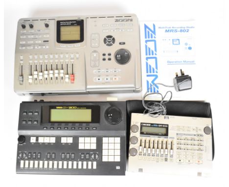 Home music studio recording equipment comprising Zoom MRS-802 multitrack recording desk, Yamaha QY300 sequencer and a Boss BR