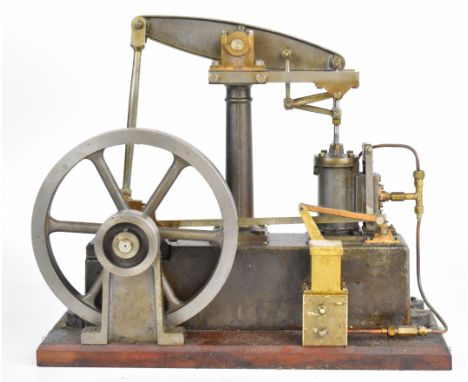 Stuart Beam live steam engine with eccentric type lubricator driving a spoked flywheel, on wooden base, overall size 35.5 x 1