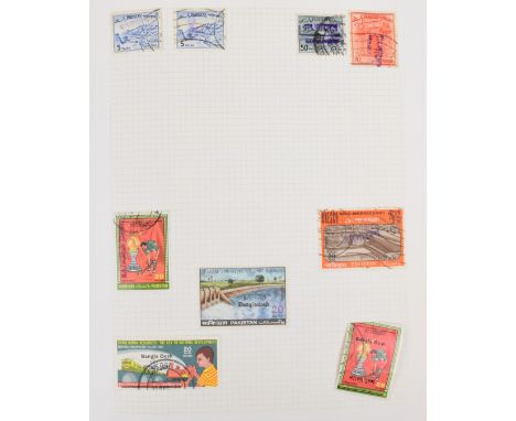Bangladesh, Burma, Tibet and Nepal stamp collection in a black stamp album