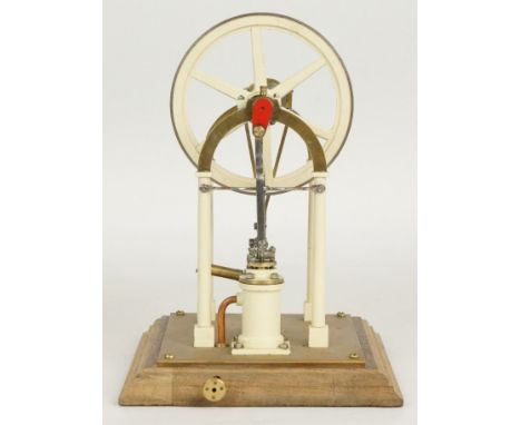 Tubal Cain Georgina inverted single cylinder live steam engine with turned column supports, driving a spoked flywheel and ecc