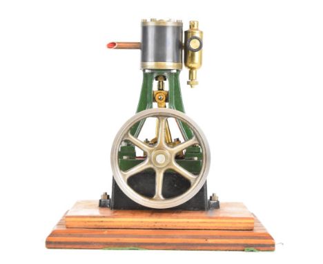 Stuart 10V vertical single cylinder live steam engine with spoked flywheel and displacement lubricator, on wooden base, heigh