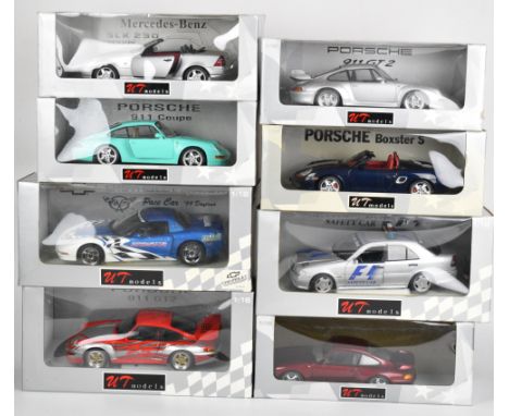 Eight UT Models 1:18 scale diecast model sports cars to include Mercedes SLK 230, Chevrolet Corvette, Porsche 911 Coup&eacute