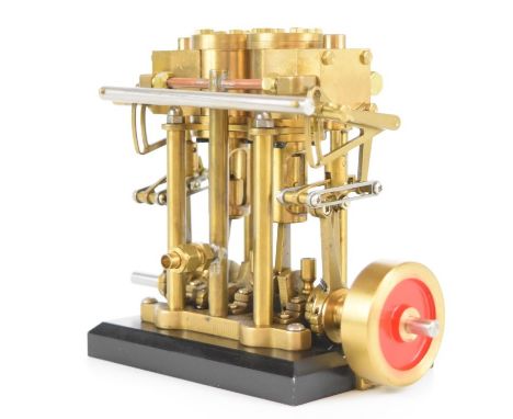 Twin cylinder live steam engine with solid flywheel and Stephenson's link reversing gear, length 12.5cm, in Perspex display b
