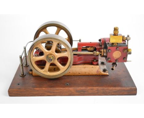 Stuart No 8 live steam single cylinder engine with twin flywheels, throttle valve and twin cylinder drain cocks, on wooden ba