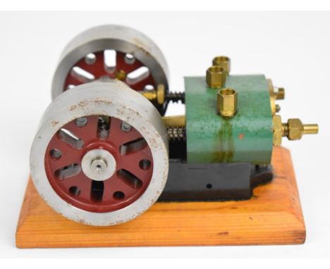 Single cylinder poppet valve live steam engine with twin cam valve drive and twin 7cm flywheels, on wooden base, length 15cm