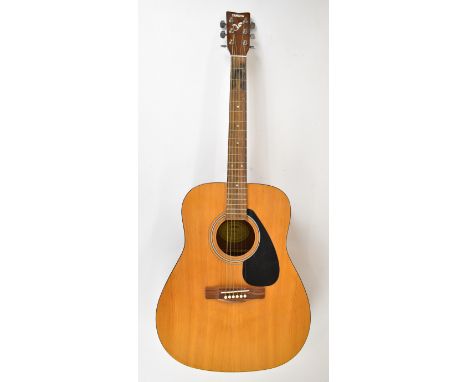 Yamaha F310 acoustic guitar in natural finish with spruce top, rosewood back and fingerboard, made in Indonesia.