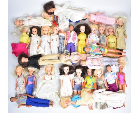 Thirty one mostly vintage Sindy fashion dolls by Pedigree and Hasbro, all in original outfits.