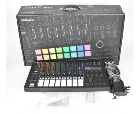 Roland MC-707 Groovebox music sequencer with drum machine and synth capabilities, in original box with manual, power supply a