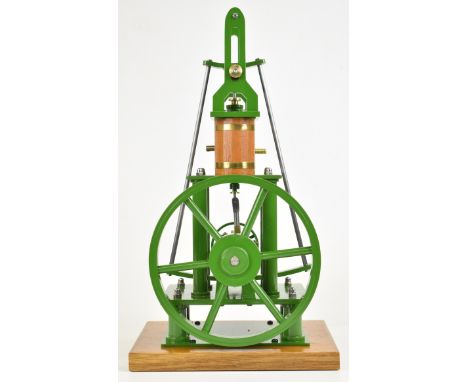 Douglas Russell of&nbsp;Fraserburgh, single cylinder live steam engine with wooden lagged cylinder, driving a spoked flywheel