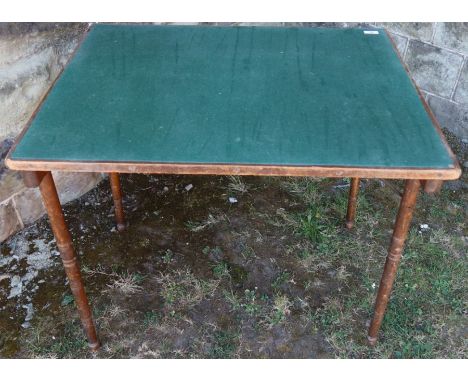 A folding card table
