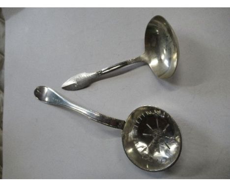 An Antique Swedish silver sifter, dated 1823, together with a Swedish silver ladle 1928, weight 2.5oz