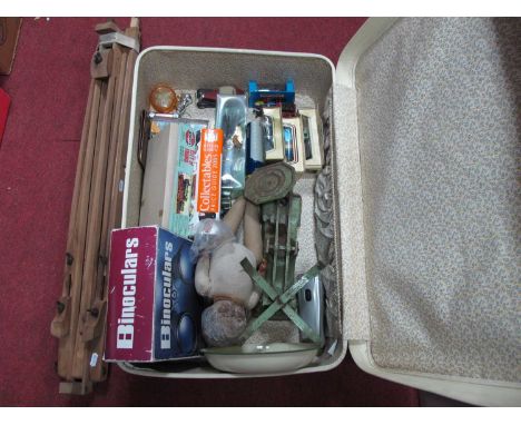 Kitchen Scales Weights, binoculars, die cast cars, artist easel stand, etc, in a white vintage suitcase.