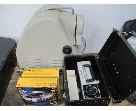 Charles Bessler VU-LYTE II Projector, together with an Elmo slide projector, two Kodak slide trays.