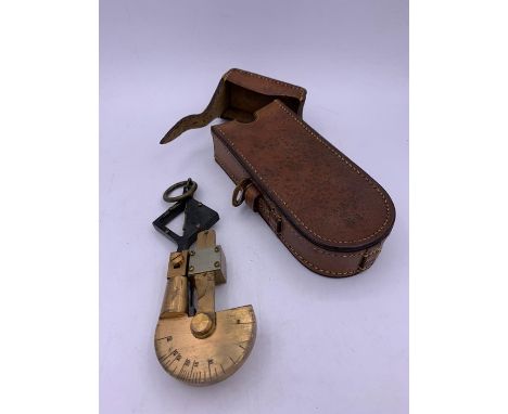 A De Lisle Pattern Handheld Pendulum Clinometer from the WW I period in a WWII case dated 1941