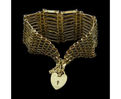 9ct gold ten bar gate bracelet, with heart locket clasp, hallmarkedCondition Report:Approx 19.15gm