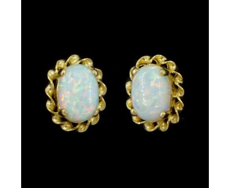 Pair of 9ct gold opal stud earringsCondition Report:Approx 1.05gm, head = 9.5mm x 7.5mm, good condition
