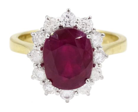 18ct gold oval cut ruby and round brilliant cut diamond cluster ring, hallmarked, ruby approx 3.40 carat, total diamond weigh