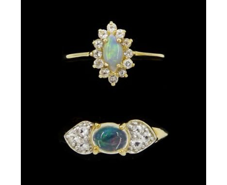 Two gold opal and white topaz rings, both hallmarked 9ctCondition Report:Approx 4.65gm, both size N, good condition