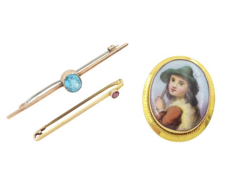 Early 20th century gold portrait of a boy painted on porcelain, gold blue paste stone brooch and one other garnet brooch, all