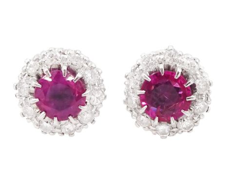 Pair of platinum and white gold round cut ruby and round cut diamond cluster stud earrings, total ruby weight approx 1.35 car