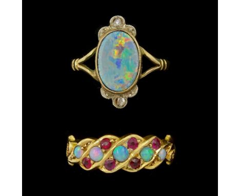 Victorian 18ct gold opal and ruby ring, Chester 1895 and an early 20th century gold opal and rose cut diamond ring, stamped 9