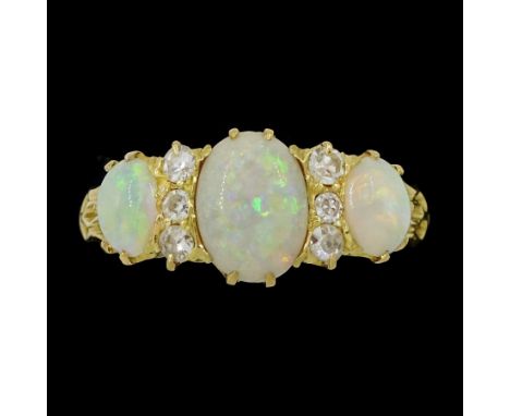 Early 20th century 15ct gold three stone opal and six stone old cut diamond ringCondition Report:Approx 3.8gm, size P-Q, opal