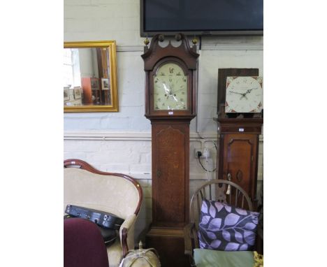 An early 19th century oak cased longcase clock, the swan neck pediment over an arched painted dial depicting birds and inscri