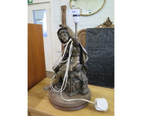 A bronzed metal figure lamp, of a nude traveller looking to the distance, on a timber base, 38 cm high 