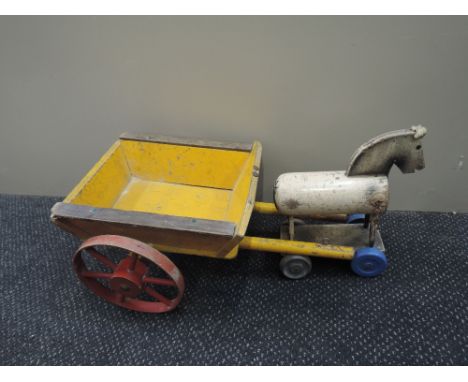A vintage wooden pull along horse and cart