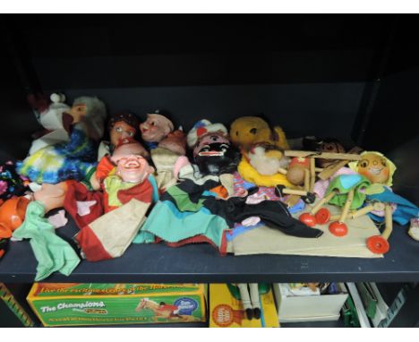 A selection of mixed vintage glove and string puppets including Pelham, Sooty etc