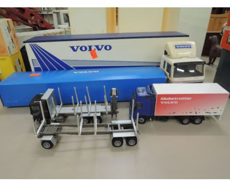 A Conrad diecast Volvo timer wagon & trailer, a Joal diecast Volvo Globetrotter wagon and a Emek (finland) plastic Volvo arti