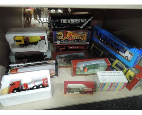 A shelf of mixed diecasts including Lion Car, Corgi etc, most boxed