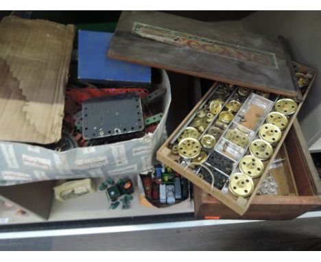 A selection of vintage Meccano including part set in wooden box containing brass pulleys etc 