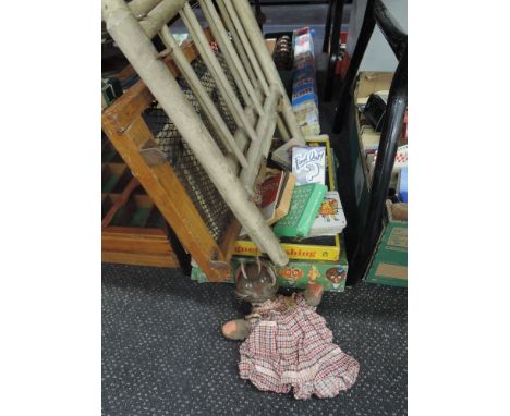 A vintage triang dolls cot, glove puppet, playing cards and games