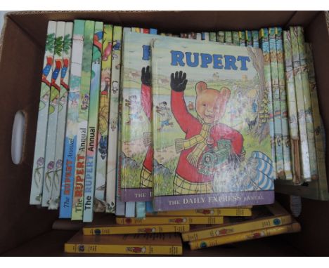 A box of vintage Rupert Bear annuals and box, approx 44