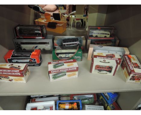 A shelf of diecast buses including Corgi, Oxford, EFE etc