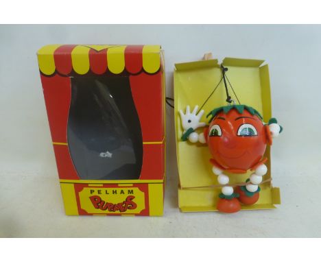 A 1980s Pelham Puppet of a tomato, based on a Ladybird book.