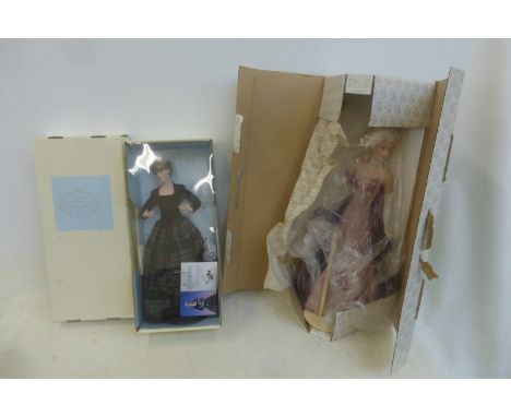 A boxed Franklin Mint porcelain portrait doll, 'Diana Princess of Wales' and one other 'Heirloon' doll with collapsable wardr