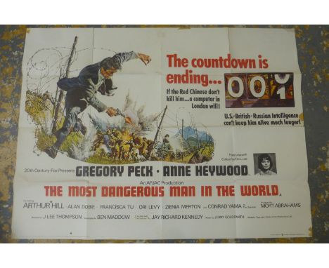 A large film poster titled 'The Most Dangerous Man in the World', starring Gregory Peck.