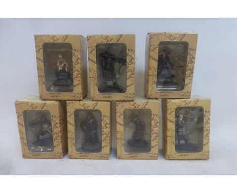 Seven boxed Lord of the Rings figures.