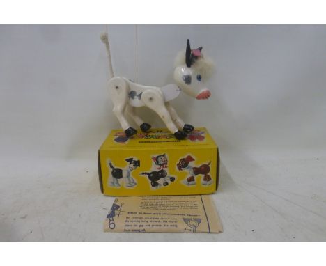 A Pelham puppet - 'Little White Bull', with floral head dress, in original box of issue with instructions.